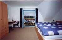 Schlafzimmer Fereienwohnung 9/10, Haus III